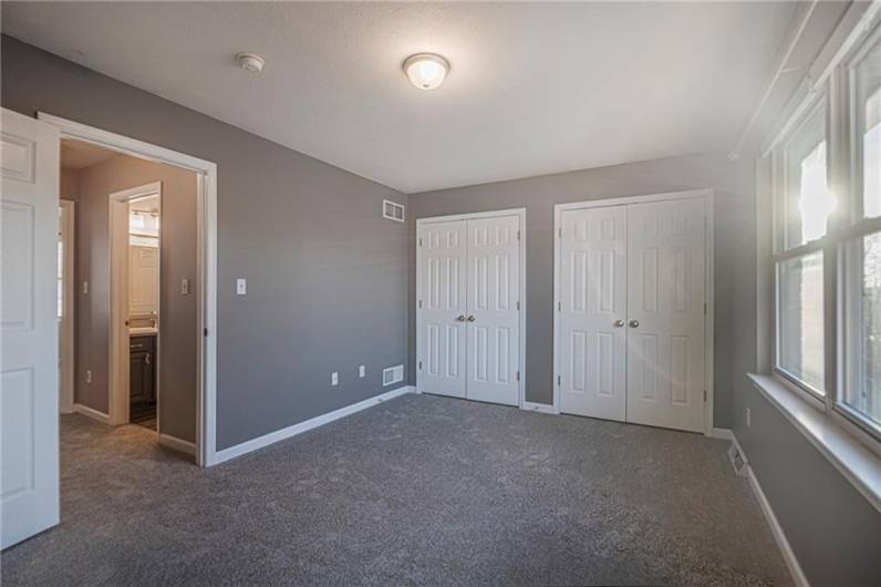 Second bedroom with new carpet.