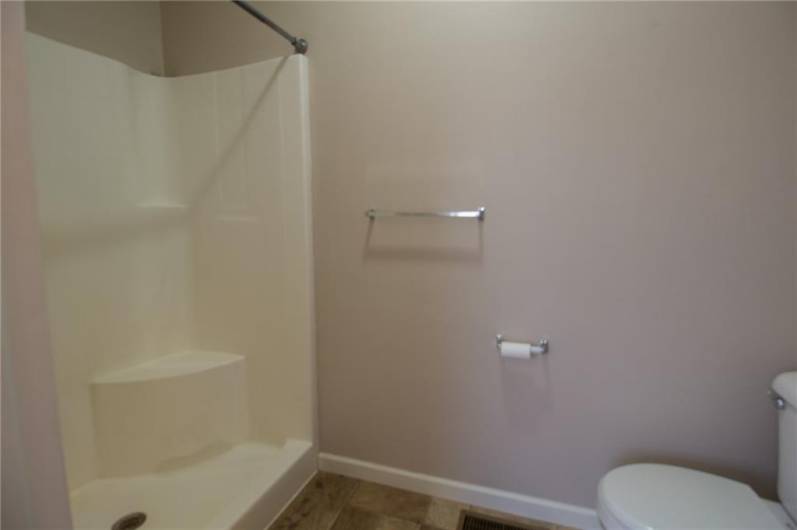 primary bathroom has tub and shower