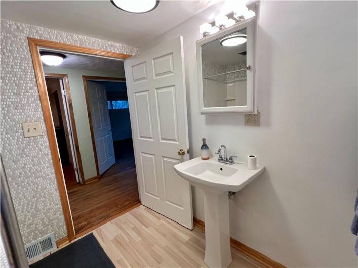 Nice pedestal sink and vanity!