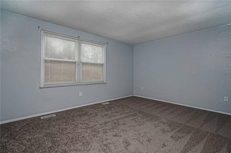 Brand-new carpeting adds comfort to this space.