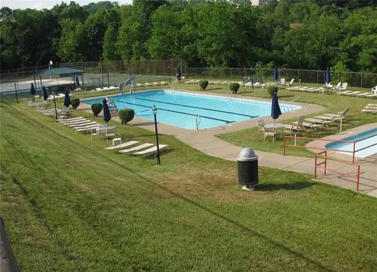 The community pool is the perfect space to cool off this summer with the whole family!