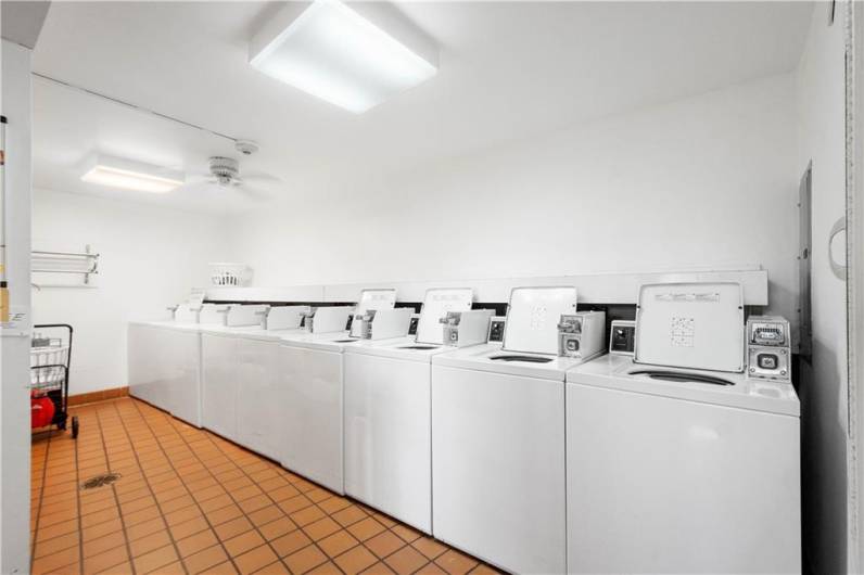 Coin operated laundry is clean and neat.