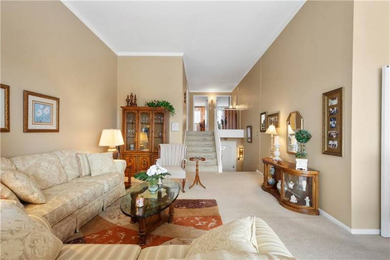 High ceilings add to the living room's spacious feel.