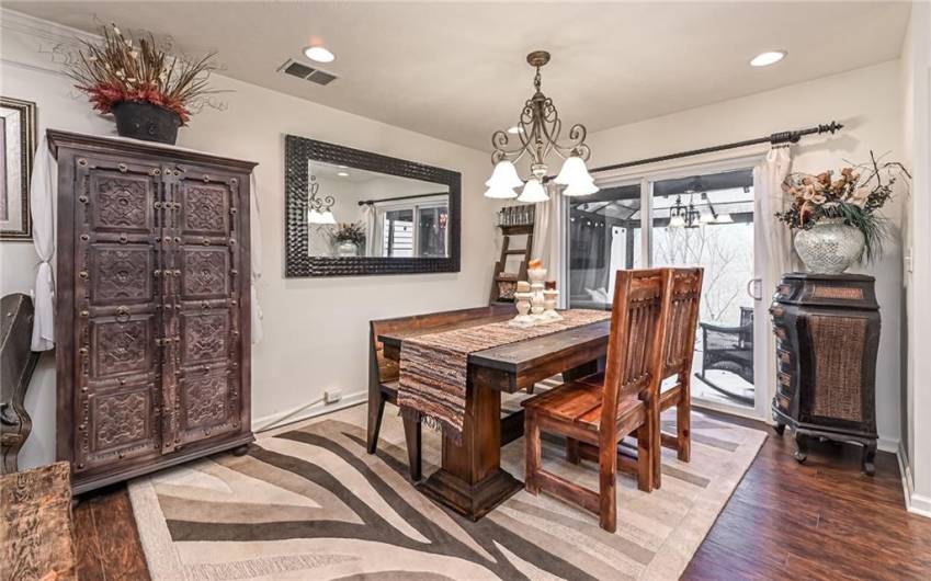 Sliding door leads to a private patio