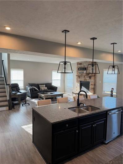 Kitchen Island Looking into Great Room.