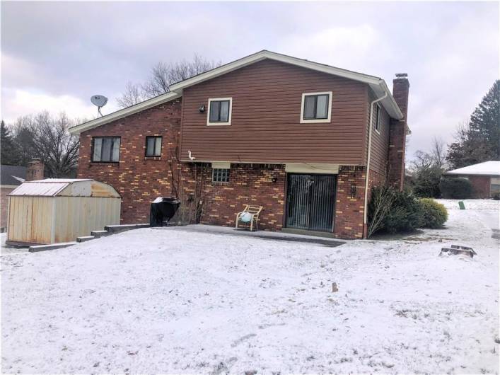 Exterior rear of home and yard