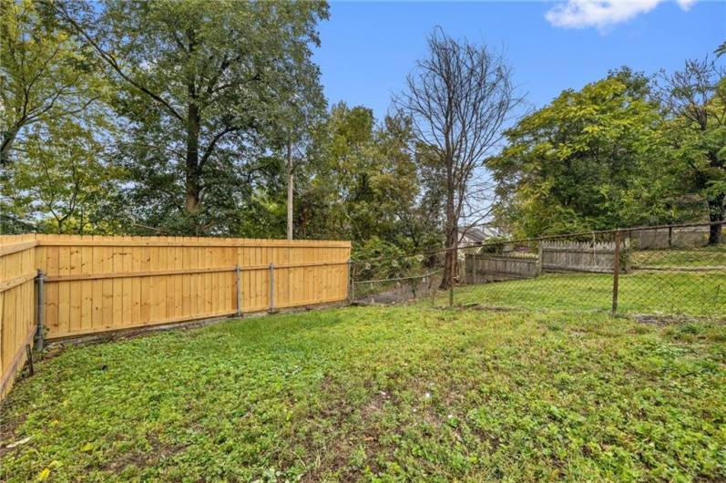 Sizeable and partly fenced backyard