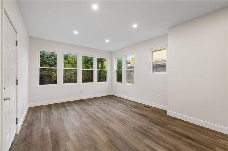 Sunny living room with lots of windows and modern open floor plan