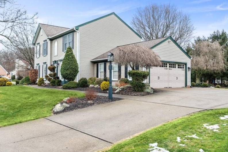 2 car attached garage with plenty of driveway parking