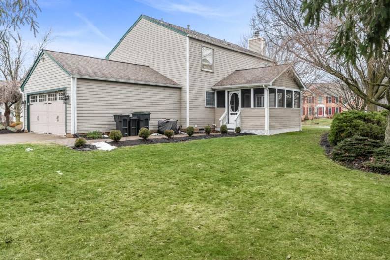 back yard and covered porch access