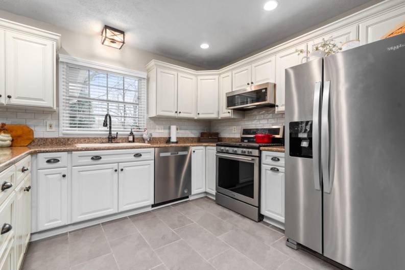 Kitchen view 2 SS appliances and plenty of counter/cabinet space