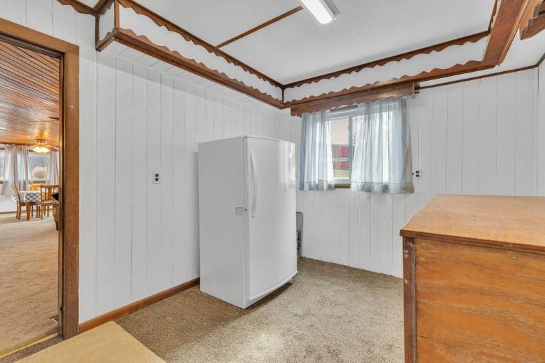 Mud room is off screened in porch and main living room.