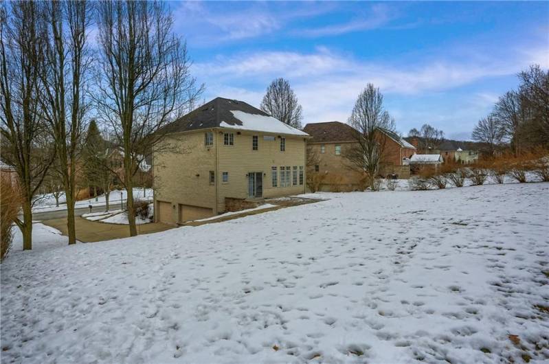 Imagine yard games and memories that will be made in this expansive yard.