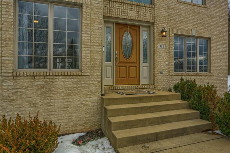 Greet guests at the front door and into the spacious foyer.