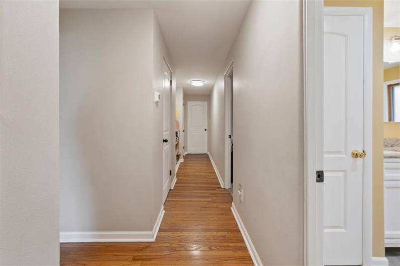 This long hallway on the first floor leads you to 3 spacious bedrooms and 2 full bathrooms. A must see if you are looking for a 