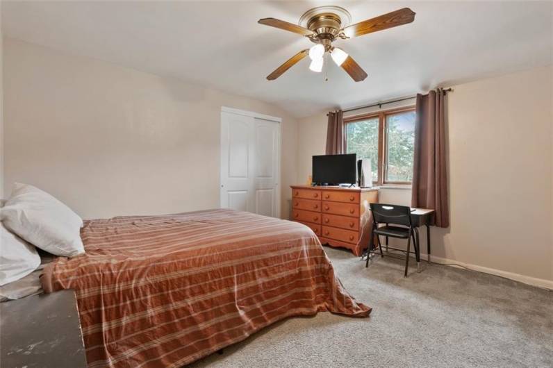 One of bedrooms on the first floor, light, bright and cheerful!