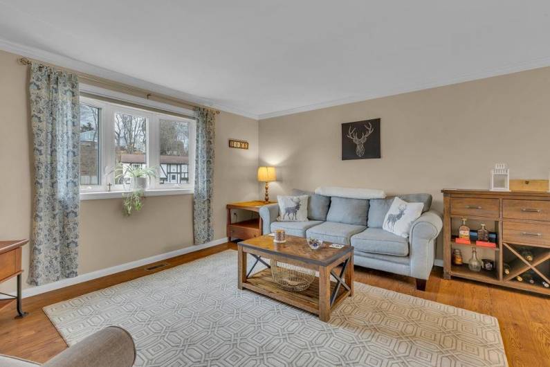 Spacious living room with large window