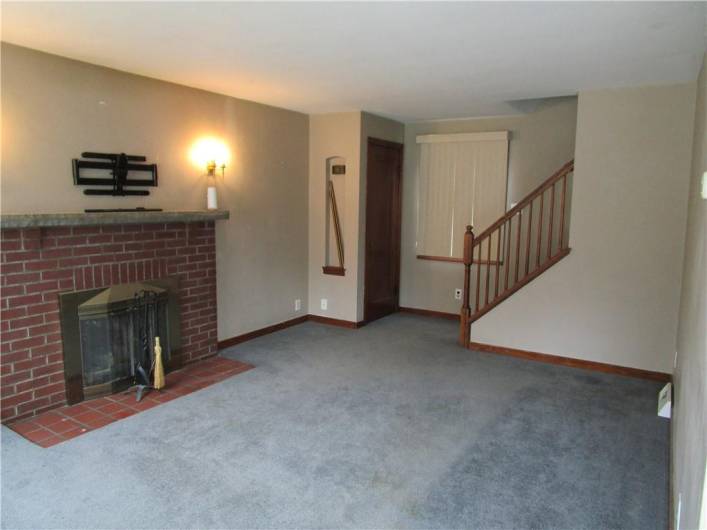 As you enter the house there is a 4x4 ceramic tile entry, to the left is the living room with the gas fireplace to keep you warm on those colder nights.