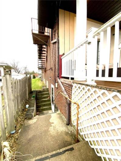 Outside entrance to lower level apartment