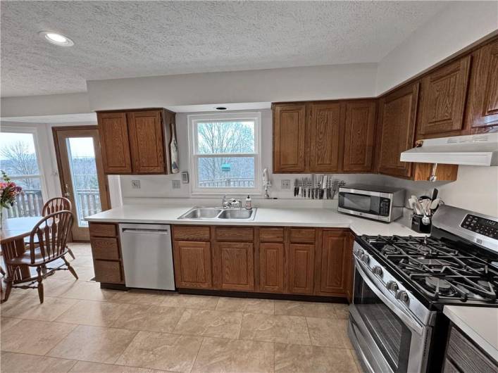 Stainless steel appliances plus brand new flooring.