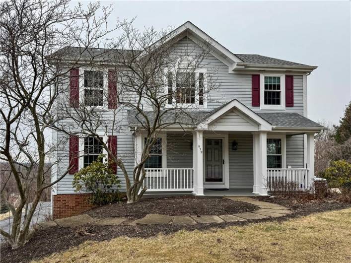 Stylish two-story home with front porch.