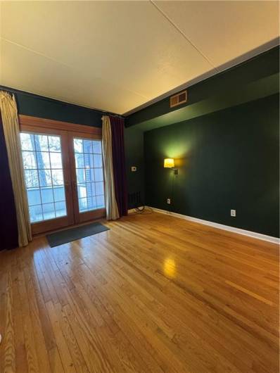 French door to the balcony letting in lots of natural light.