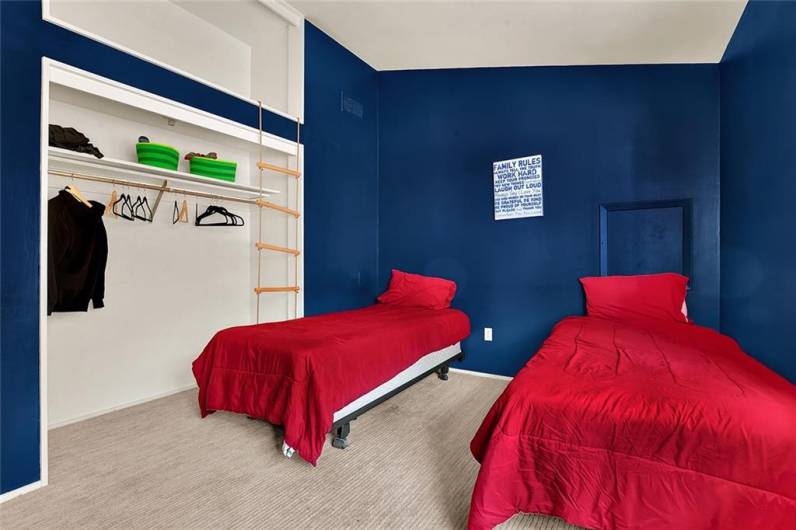 Bedroom #2 features built-in bunk beds above the closets.