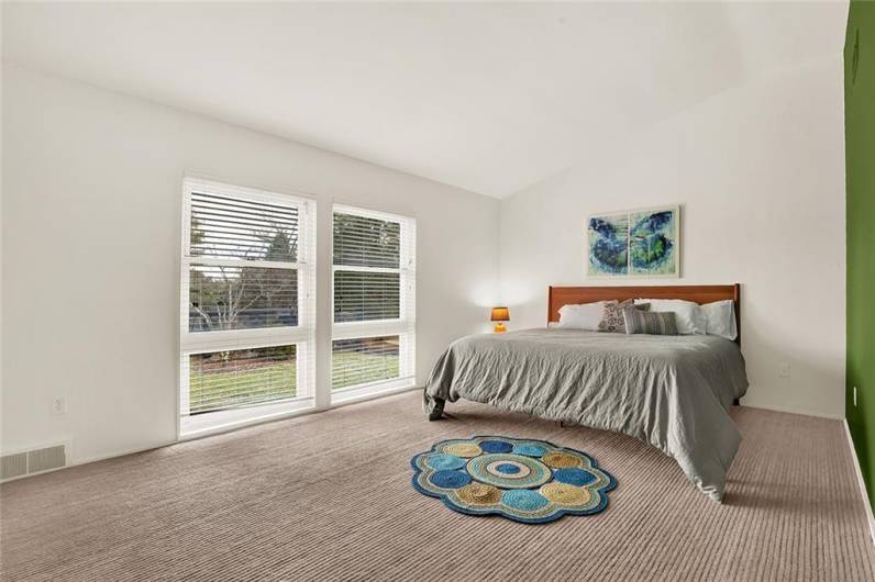 Bedroom #3 features oversized windows overlooking the front yard and lots of natural light.