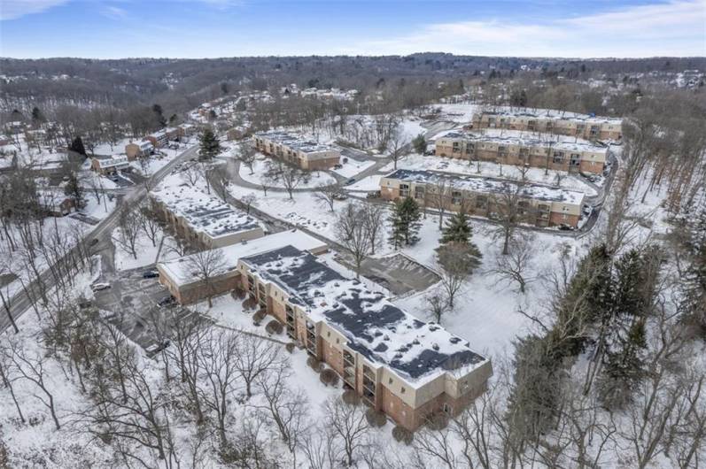 Ariel view  of building.  No stairs from front parking lot to front door.