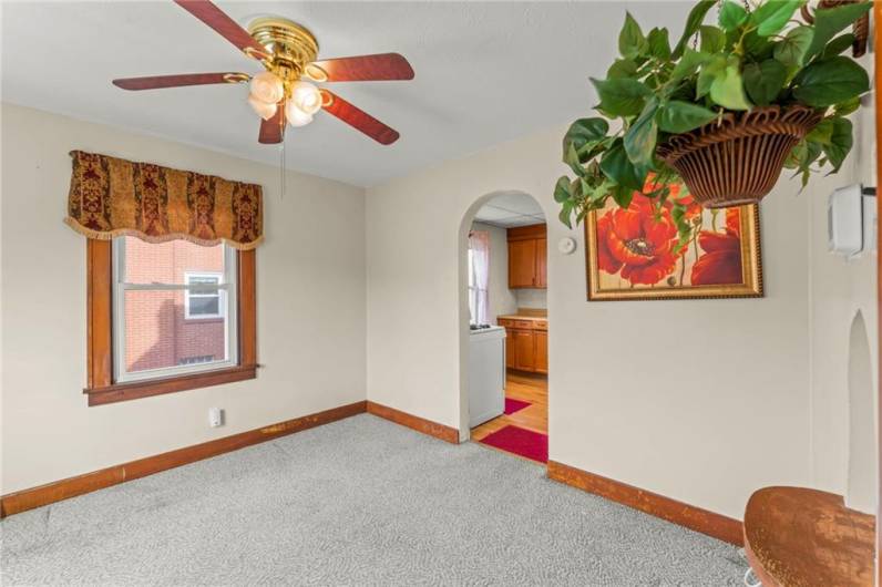 View of dining room from the front entrance of the home.