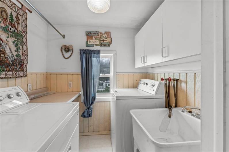 Laundry room off of main floor bathroom.