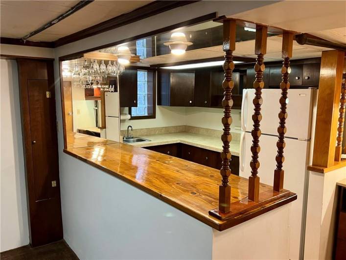 Wet bar w/glass rack and refrigerator