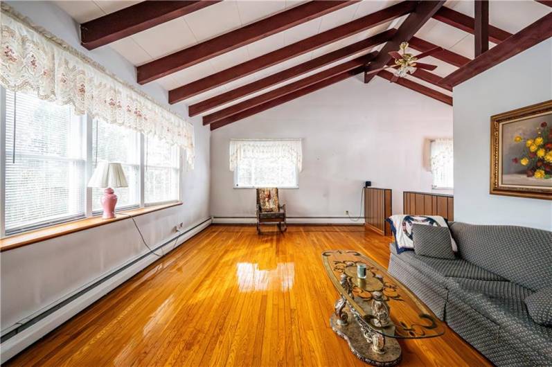 GREAT HARDWOOD FLOORS THROUGHOUT THE HOUSE.. CHECK OUT THE CEILINGS AND THE NATUAL LIGHT FROM THE BANK OF WINDOWS