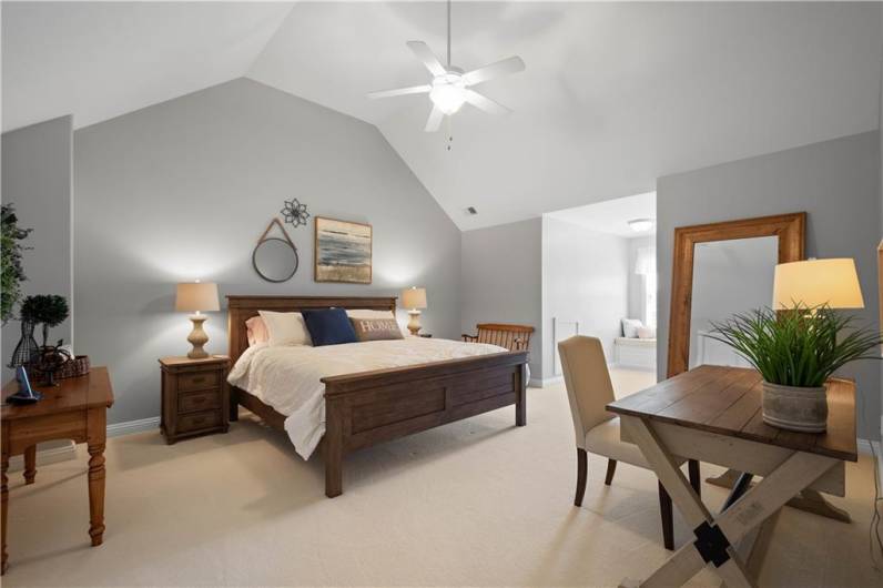 Another large bedroom on the second floor has a cathedral ceiling, dormer and walk-in closet.