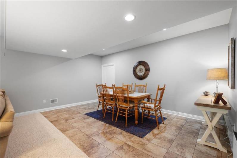 Behind the dining area in the gameroom is a very large storage room.  There is plumbing for a future wet bar or kitchenette.