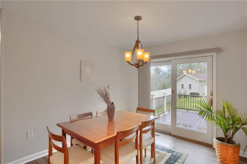 The neutral tone throughout glistens in the dining area.