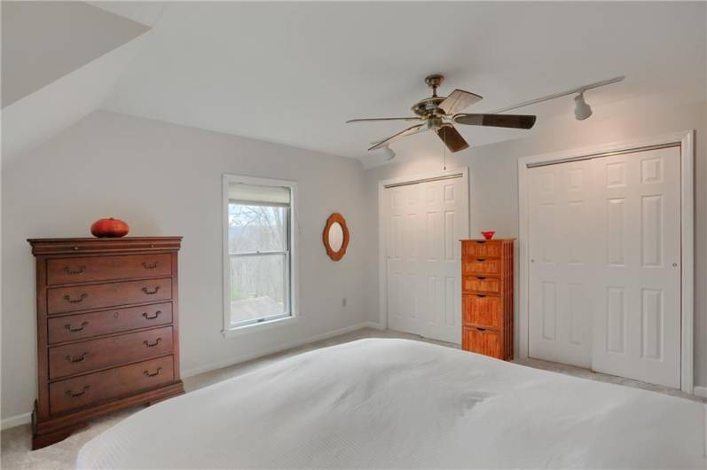 Two  large wall closets are featured in the second level primary bedroom.