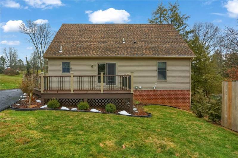 An expansive composite deck is off the eat in dining area and creates the perfect place for outdoor meals.