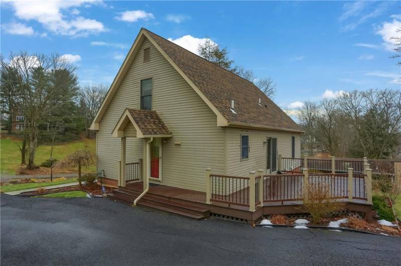 The driveway conveniently leads to a side family entrance.