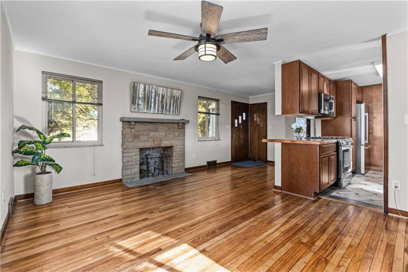 Nice view of the fully renovated kitchen and updated lighting/fan combination.