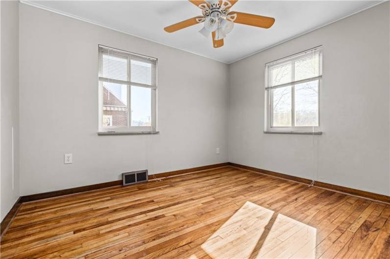 Hardwood flooring and light/fan combination.