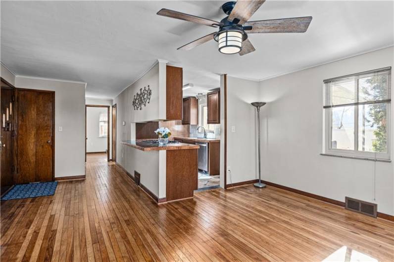 Enter into home with gleaming refinished real hardwood flooring.