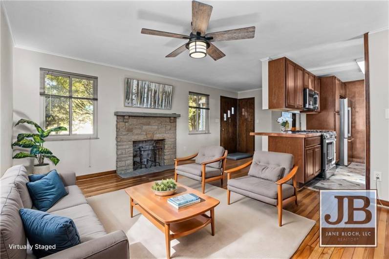 Virtually Staged Family Room.  Room to Right to place a dining table.