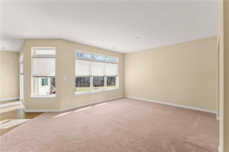 Plenty of Natural Light in 18x14 Living Room w/ Custom Blinds and Transom Windows above for Additional Natural Lighting