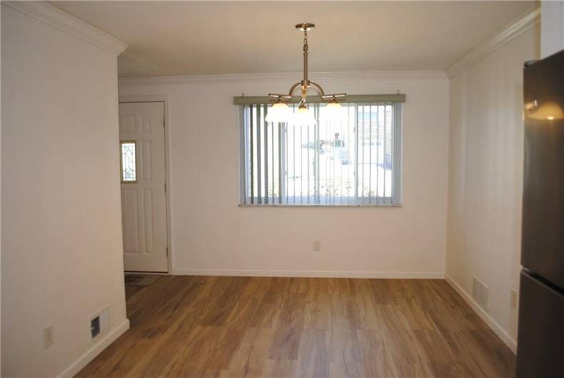 Dining room off kitchen with new flooring