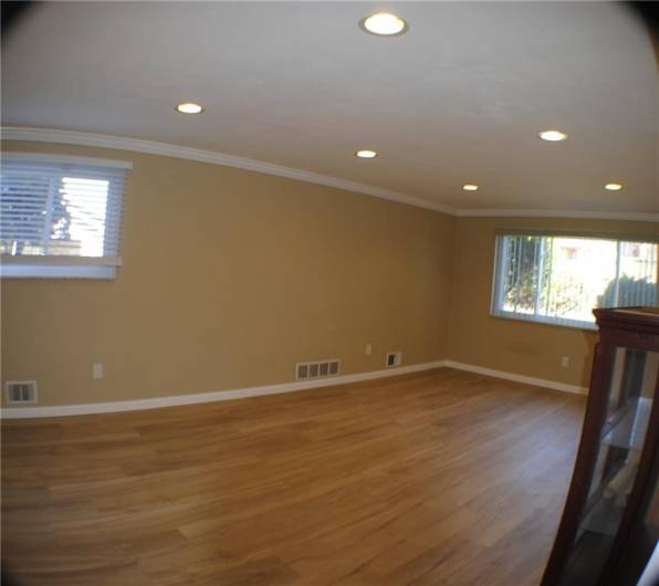 Large living room 21x13 with new flooring.