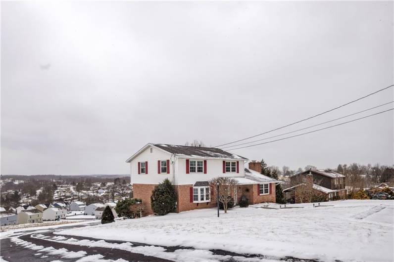 View from street showing paved driveway