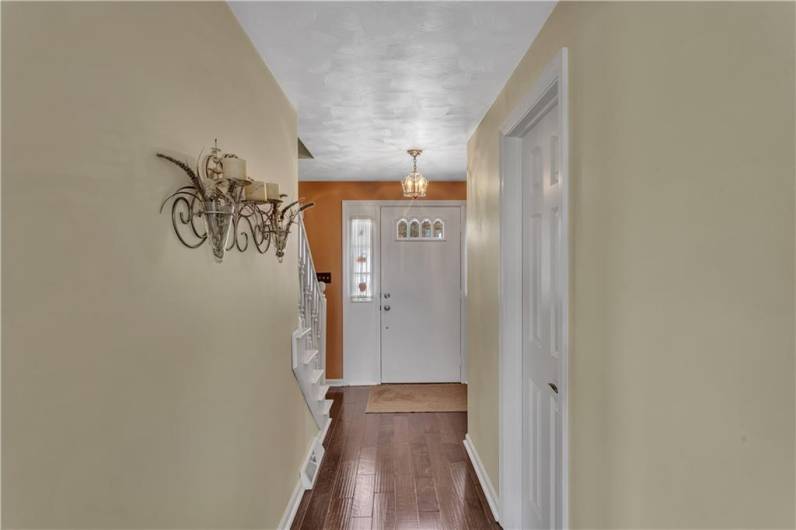 The inside view of the gorgeous front door that includes 2 sidelight windows!