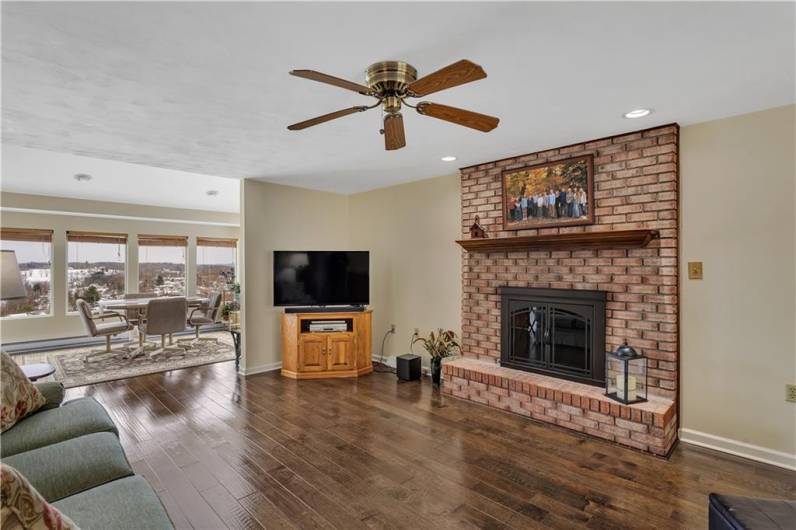 Another view of the warming family room looking into the sunroom