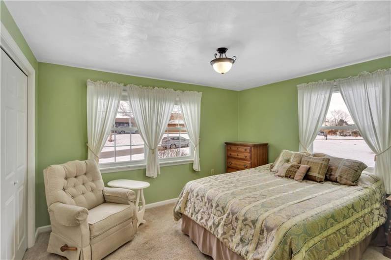 This bright & airy bedroom has a large closet and plenty of room for furniture